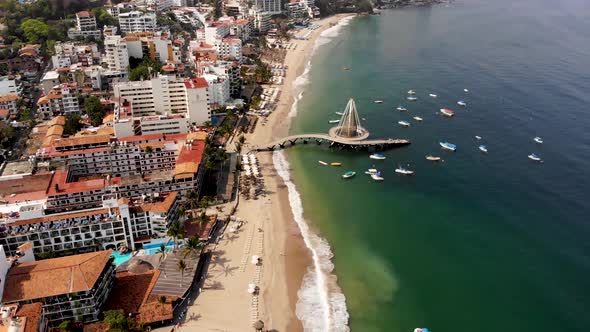 Aerial drone footage of the beautiful pier known as Playa Los Muertos pier in Mexico