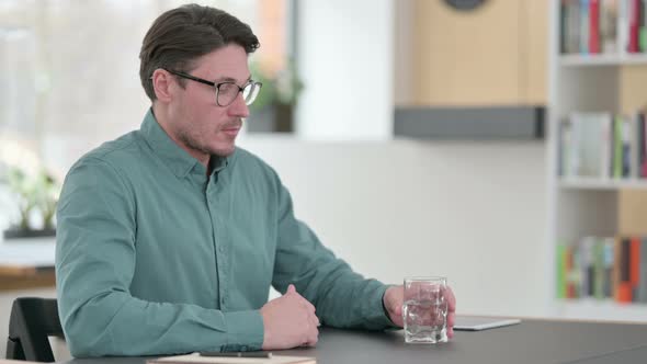Attractive Middle Aged Man Drinking Water alt