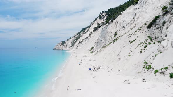 Drone view of scenic beach with white sand and turquoise sea, Greek islands. alt