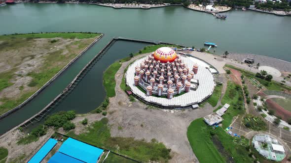 top down aerial view of 99 orange domes mosque in Makassar city Sulawesi indonesia along the water o alt