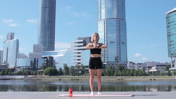 Woman working out in city