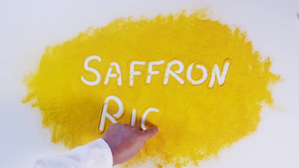 Hand Writes On Turmeric Saffron Rice alt