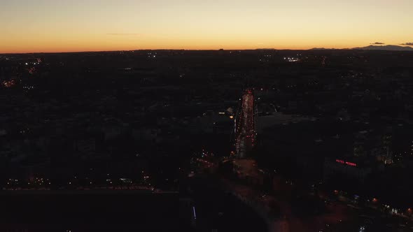 Aerial Panoramic Footage of Traffic in Streets of City alt