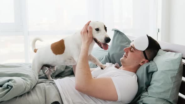 Man with Dog in the Bed alt
