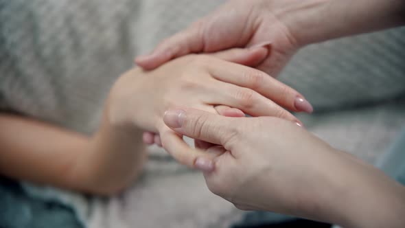 Massage - Masseuse Is Kneading the Beautiful Fingers of a Young Woman alt