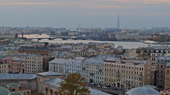 Rooftop view of Saint Petersburg city and Neva river. Lahta center on horizon