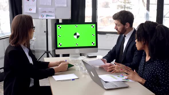 Multiracial Successful Business Colleagues Working Together in Modern Office Study Financial alt