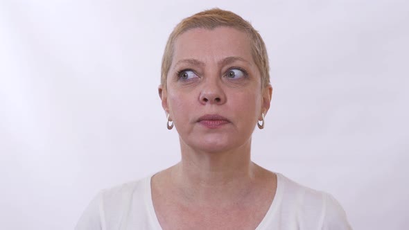 Portrait of an Adult Smiling Woman with a Short Haircut alt