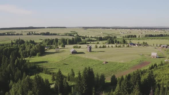 Drone Footage of Traditional Antique Wooden Windmill at Russia. Mills Blades Turning By Wind alt
