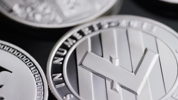 Rotating shot of Bitcoins (digital cryptocurrency) - BITCOIN LITECOIN  alt