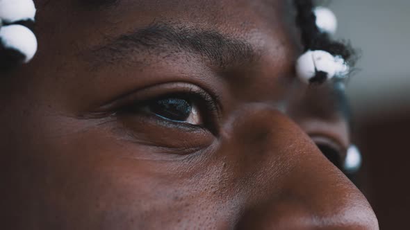 Close Up Sad Eye of African American Black Man alt