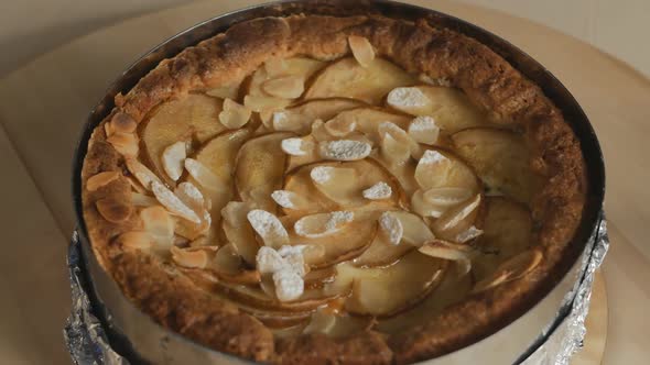 Rotating Sweet Dessert Pie with Pear and Almonds