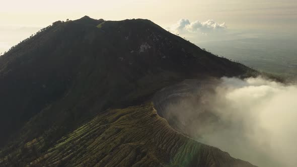 Aerial Shot of Active Volcano Crater. Sunrise Indonesia.