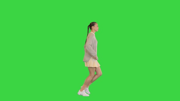 Happy Healthy Sporty Girl Running on a Green Screen Chroma Key alt