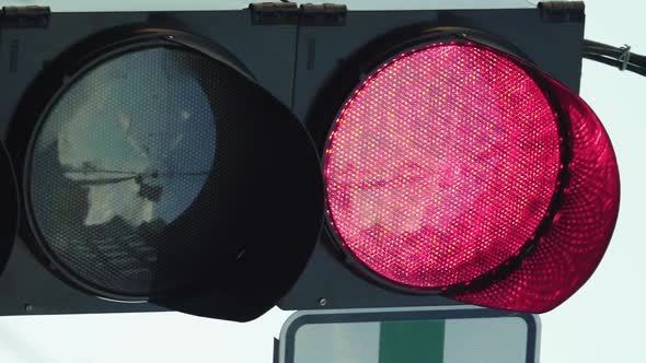 Traffic Light on the Road During the Day Vertical Video alt