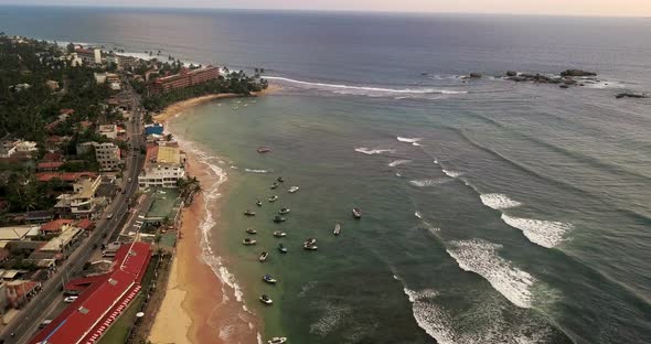 Tropical Landscape of Coastal Town and Its Sand Seashore