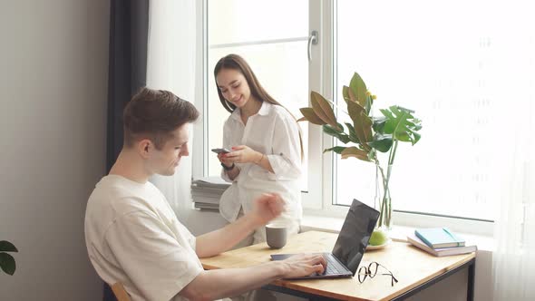 Man Work at Home, He Is Freelance During Quarantine Coronavirus. alt