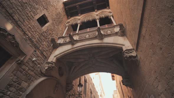 Bridge Between Buildings in Barri Gotic Quarter of Barcelona Spain alt