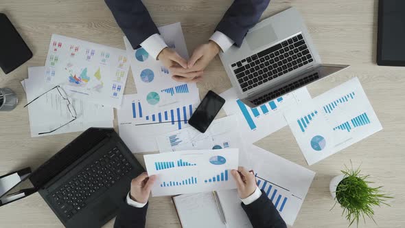 Nervous Employee Waiting for Boss Decision on Project Strategy, Office Top View alt