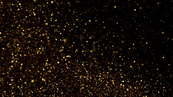 Golden Glitter Background in Super Slow Motion at 1000Fps alt