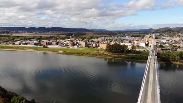 Portsmouth Ohio viewed from Kentucky over the Ohio River with the US Grant Bridge in the foreground. alt