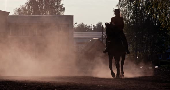 Sunset Female Silhouette Riding Horse Side View alt