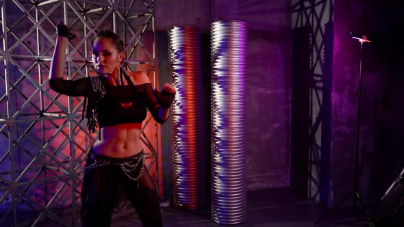 Extravagant Dancer Woman is Moving Sexy and Passion Dance alt
