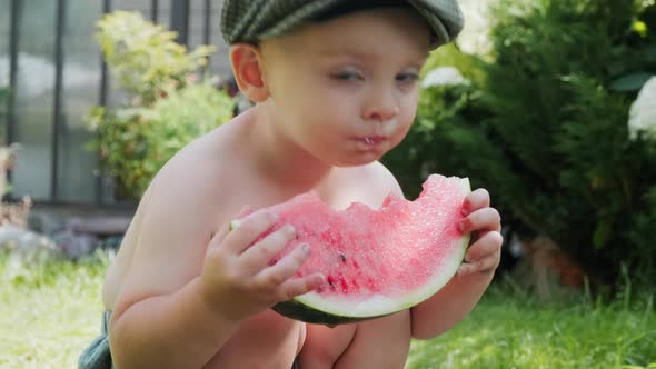 Small Boy Eating Watermelon alt
