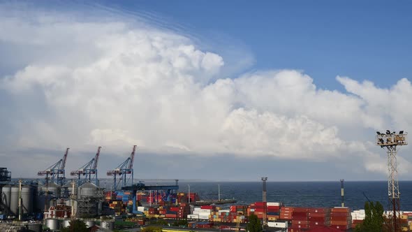 White Clouds Forming Over Industrial Port Skyline. Daytime Time Lapse  Video