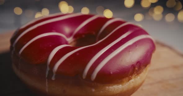 Red Doughnut on a Bokeh Background.