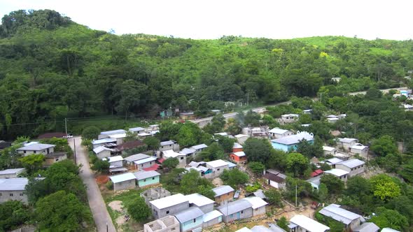 Aerial footage above village in Mexican jungle