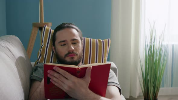 Man Is Reading Interesting Book