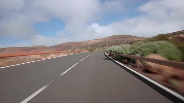 Driving a car with attached action cam in Teide National Park Tenerife alt
