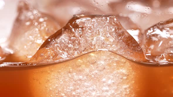 Ice Cubes in a Caramelly Brown Liquid alt