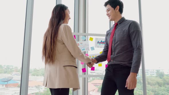 Business People Handshake in Corporate Office alt
