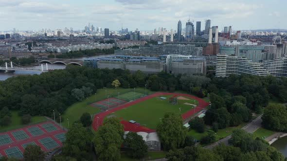 Aerial View of Battersea Park Sport Complex and Modern Apartment Houses at Thames River alt