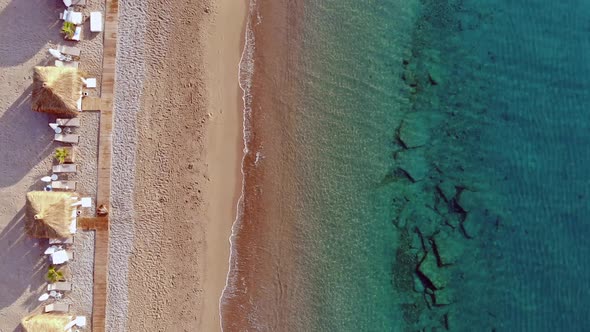 Aerial Top View On The Beach. Natural Pool