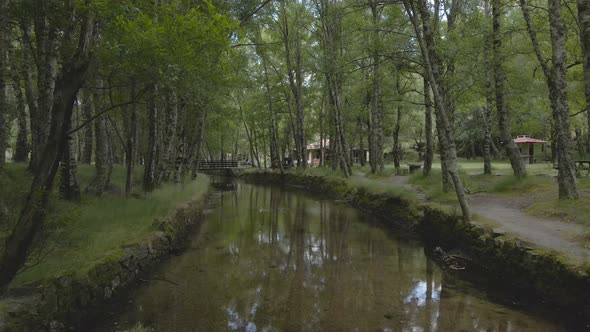 Aerial drone over Zezere river, Covao da Ametade in Serra da Estrela, Portugal alt