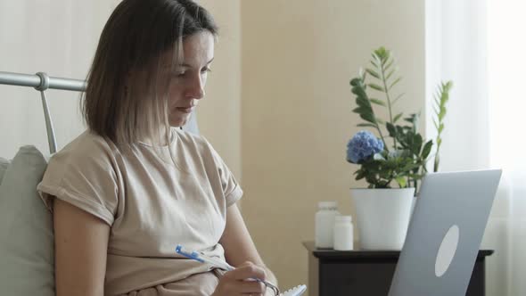Woman Consults with a Doctor Remotely