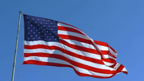 USA American Flag with a Blue Sky Background