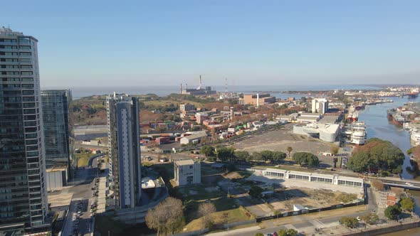 Aerial establishing shot of portuary zone of Buenos Aires city at daytime alt