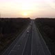 Top View on Trucks and Cars on Asphalt Road at Sunset - VideoHive Item for Sale