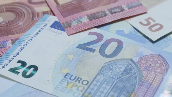 Money and business background made of European Union currency lot slow tilt 4K 3840X2160 UltraHD vid alt