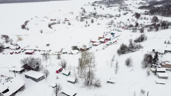 Aerial View From a Drone of a Small Village Winter Landscape Frosty Day Everything is Covered with