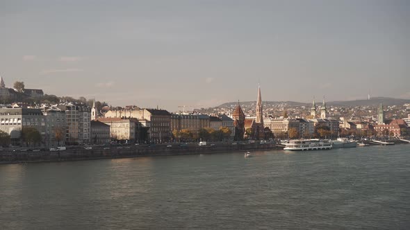 Pan Shot Left To Right of Buda and River Danube in Winter Under Blue Grey Sky alt