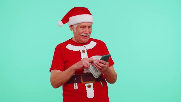 Christmas Grandfather Looking Smartphone Sincerely Rejoicing Win Success Luck Receiving Money Online alt