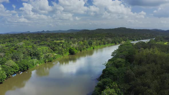 Aerial Drone View of Rainforest River and Mountains Scenery in Costa Rica at Boca Tapada, San Carlos alt
