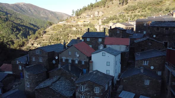 The beautiful village of Piódão in Portugal, with houses made of shale stone alt