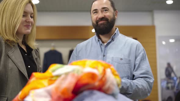 Portrait of Smiling Confident Bearded Man Counting Dollars at Cash Desk. Loving Husband Buying alt