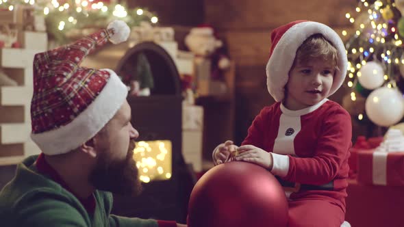 Christmas for Father and Son. Dad and Child Boy Celebrate New Year at Home. Happy Family Winter alt